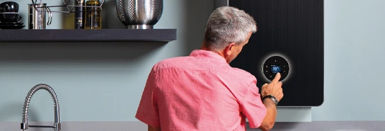 Man checking Greenstar 8000 boiler