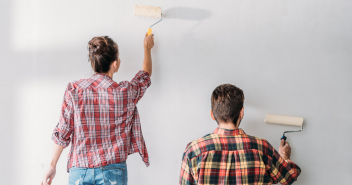 People painting wall